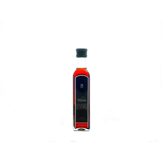Es ist eine 0,25 l Flasche im eckigen Format dargestellt. Am Etikett befindet sich das Nussböckgutlogo und der Velsecco Schriftzug.